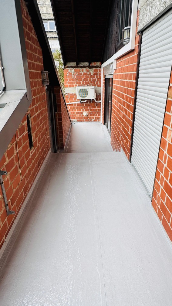 Current Schattauer entry from April 10, 2026 with completed waterproofing and natural stone structure.