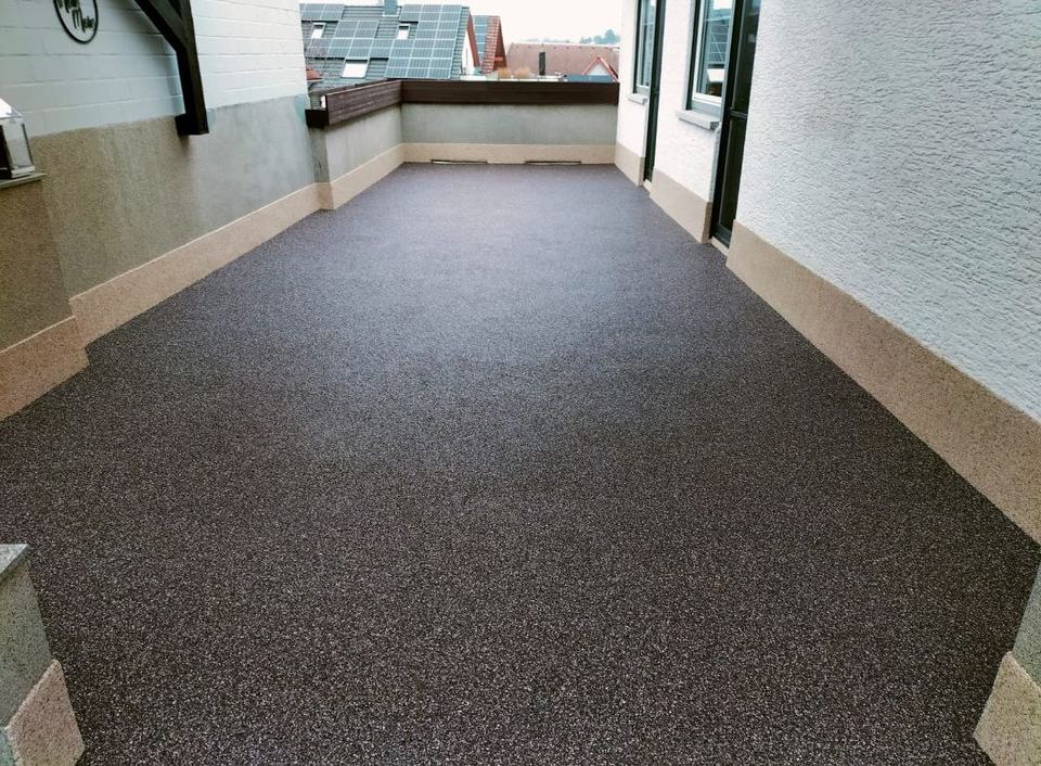 Balkonsanierung nach Fertigstellung mit neuer Abdichtung und sauberer Oberflaeche - Projektbild 088