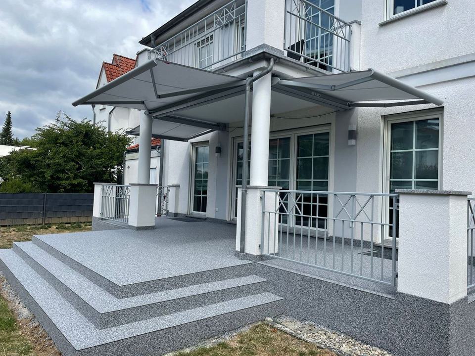 Terrassenbeschichtung in Mainz mit dekorativer Natursteinoberflaeche