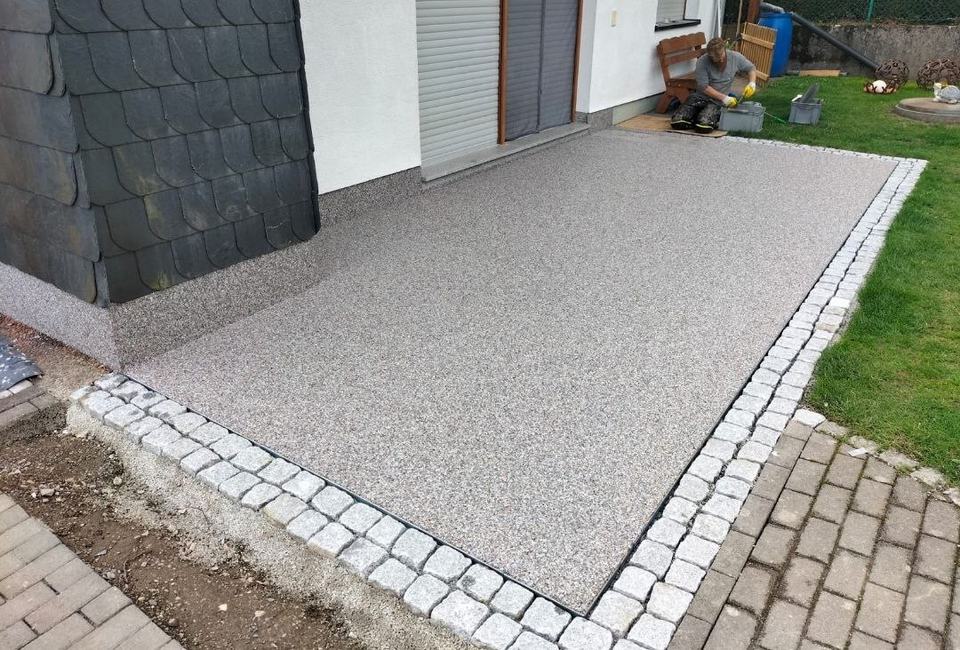 Terrassensanierung mit erneuerter Abdichtung und sauber ausgefuehrter Oberflaeche - Projektbild 056